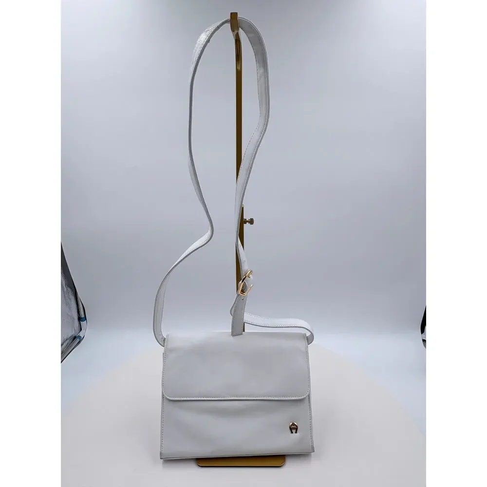 Ettienne white crossbody with wallet, makeup purse, detachable key ring and more